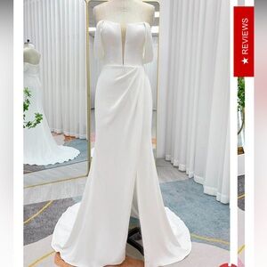 Elegant White Gown with Plunging Neckline